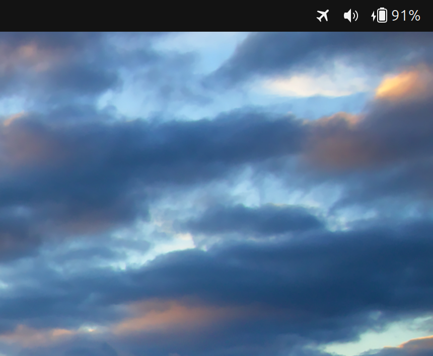 Icons at the top right of the screen (system status icons).